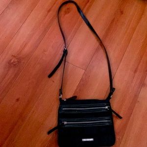 A black long cross body bag
